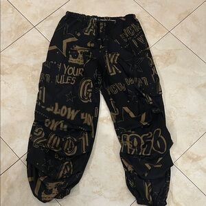 SHEIN Black and Gold Graphic Joggers
